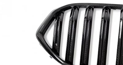 Close-up of BMW X5M F95 carbon fibre grille – gloss finish and weave detail for premium look