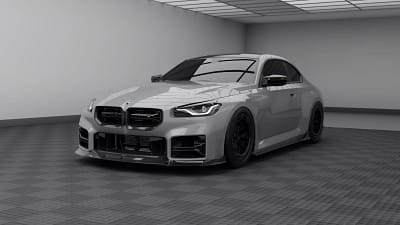 Front three-quarter view of BMW G87 M2 finished in Nardo grey, featuring full dry carbon fibre aero kit with aggressive front splitter