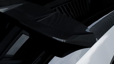 Gloss finish dry carbon fibre roof spoiler on Porsche Cayenne Turbo GT – close detail