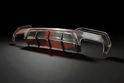 Wet carbon rear diffuser for BMW G22/G23 – gloss finish carbon fibre showing resin-rich surface and visual style
