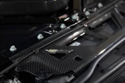 Carbon fibre slam panel cover for BMW M3 G80 and M4 G82 – lightweight engine bay upgrade by ASM Tuning with premium dry carbon finish